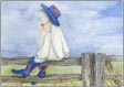Cowboy boots Mimi on fence