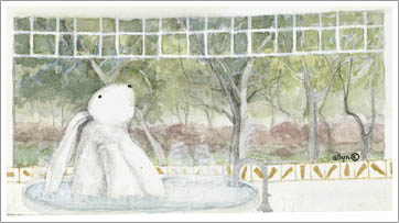 Mimi relaxing in the tub gazing out the window 