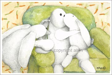 Mimi and the little ones on the green chair